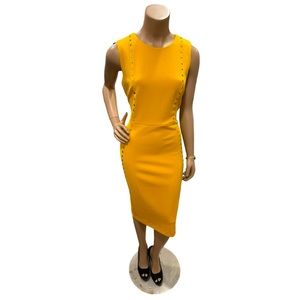 Stunning gold dress adorned with gold studs 👗🛍️✨💕